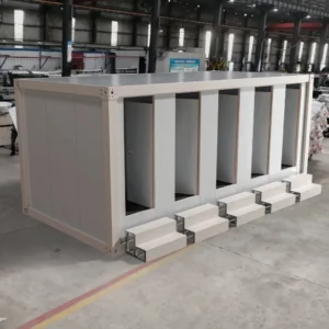 Prefab shower compartment with non-slip flooring.