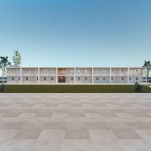 Large multi-unit double-storey container office building with external stairs.