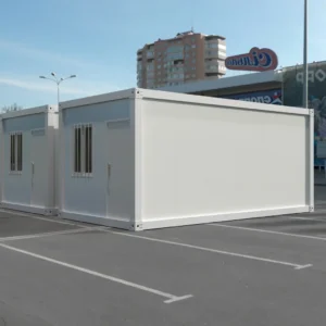 Rapid on-site assembly of modular container house by crane.