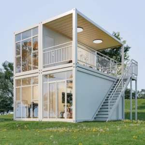 two story container home with glass patio entrance